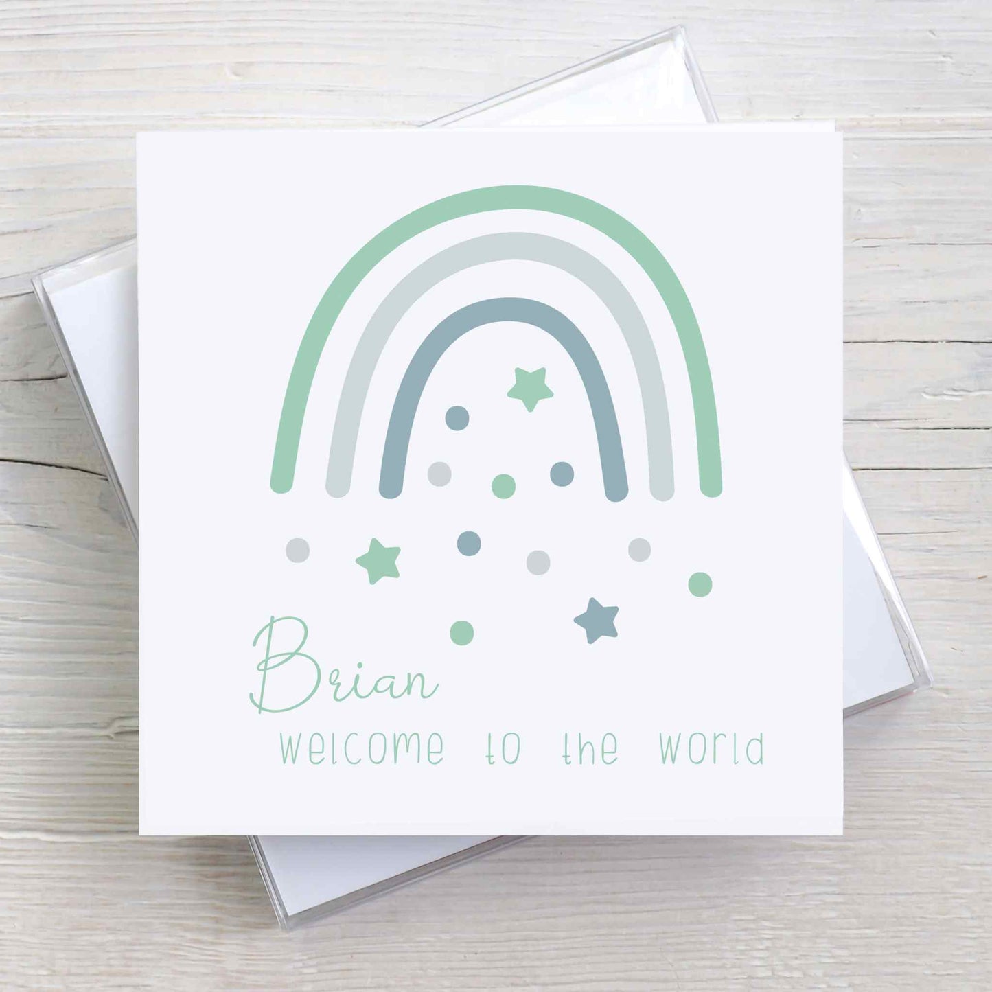 Welcome to the World Personalised baby card with Boho style green rainbow, stars, and dots.